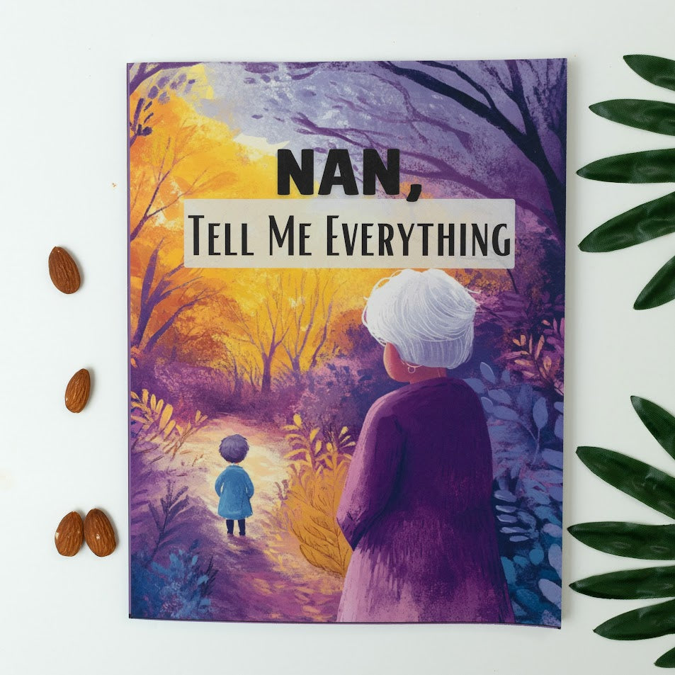 The front cover of Nan, tell me everything book on a countertop with green leaves