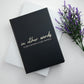 In other words book next to some purple flowers. Created by EMF publishing