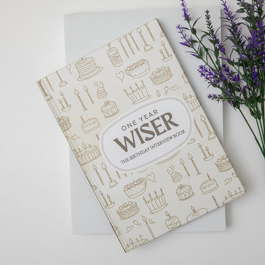 Front lay of one year wiser book by EMF publishing 