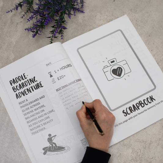 Pages inside 99 dates to remember featuring a paddleboarding adventure 
